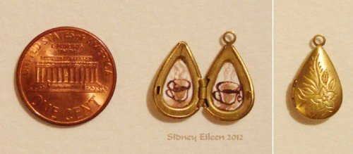 Brown Ink Teacups in a Teardrop Locket Brown Ink Teacups in a Teardrop Locket